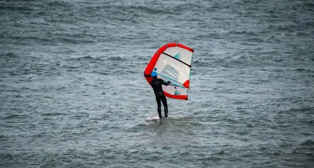 Wing Foil Surfer in Hanstholm denmark, new trend sport, wing surfing, hydrofoil