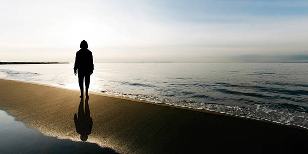 istock serene woman silhouette 136882031