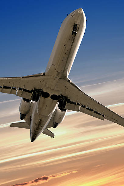 istock corporate jet airplane landing at dusk 136882147
