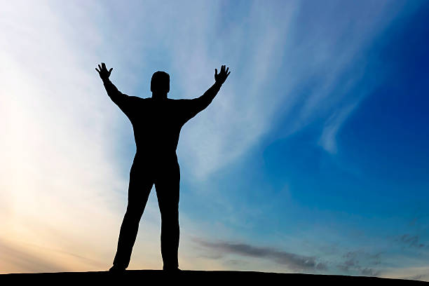 istock XXL reverent man silhouette 136882224