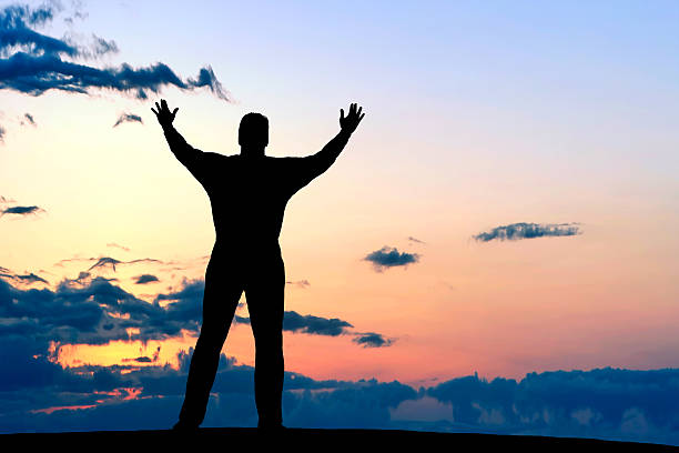 istock XXL reverent man silhouette 136882352