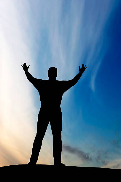 istock XXL reverent man silhouette 136882388