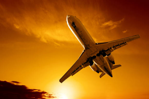 istock corporate jet airplane landing at sunset 136882682