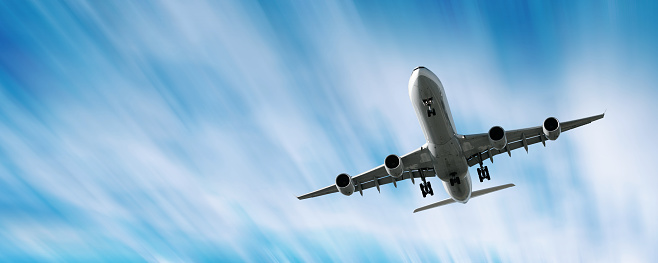 jet airplane landing in motion blur sky, panoramic frame (XXL)