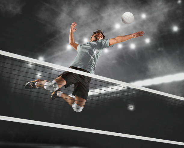 Volleyball player players in action Volleyball player players in action. Sports banner. Attack concept with copy space batting sports activity photos stock pictures, royalty-free photos & images