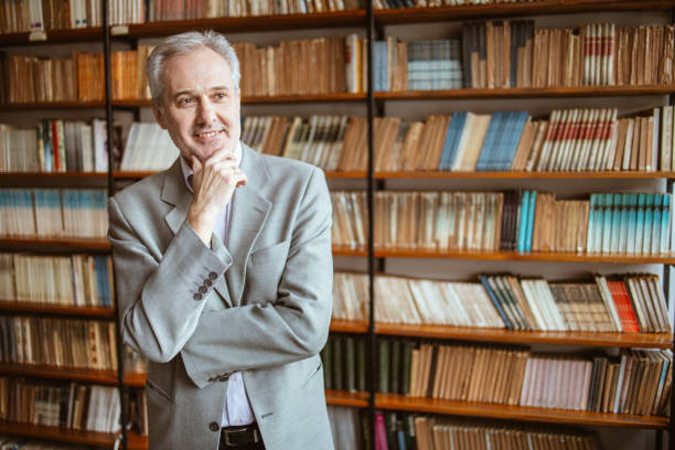 istock University teacher posing for a portrait in an university library 1368828363