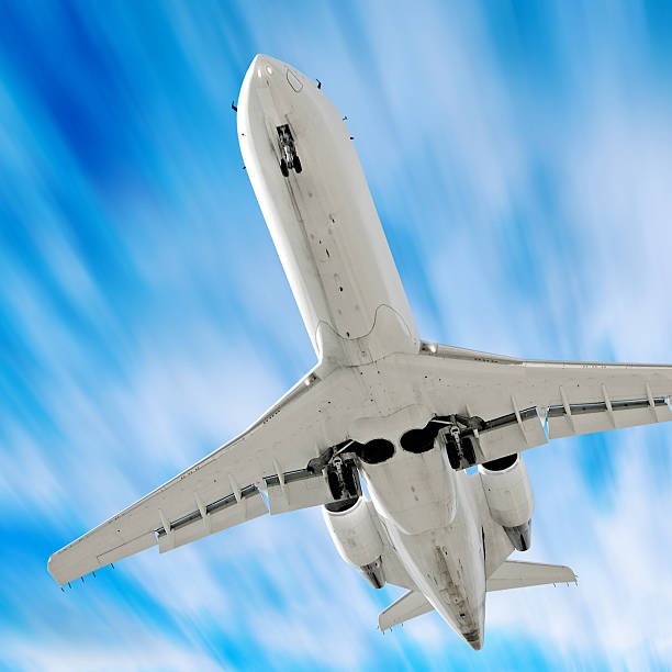 istock corporate jet airplane landing in motion blur sky 136883301