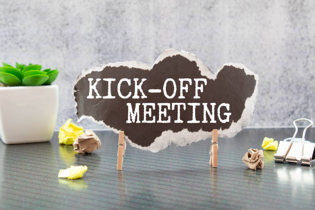 istock text KICK-OFF MEETING on black torn paper 1368834650
