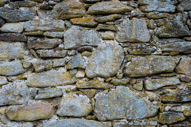 istock Stone wall. Outdoor background natural stone 1368834755