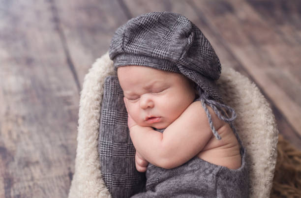 istock A newborn baby dressed in a gnome costume is sleeping 1368835886