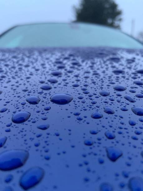 istock Rain drops on the car hood 1368836747