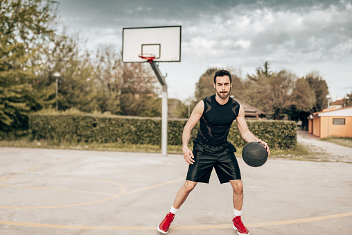 street basketball player defending