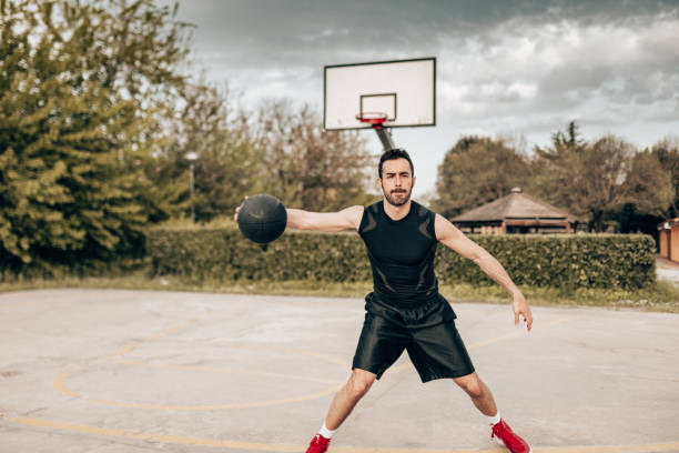 istock street basketball player defending 1368838168