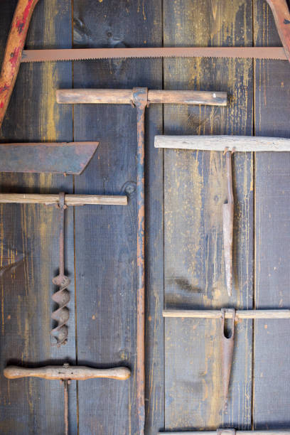 Blacksmith Shop Wall of Rusted Saws, Drills and Tools