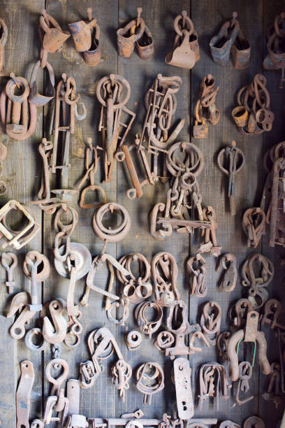 Blacksmith Shop Wall of Rusted Hooks and Tools
