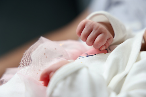 Close-up newborn baby hand