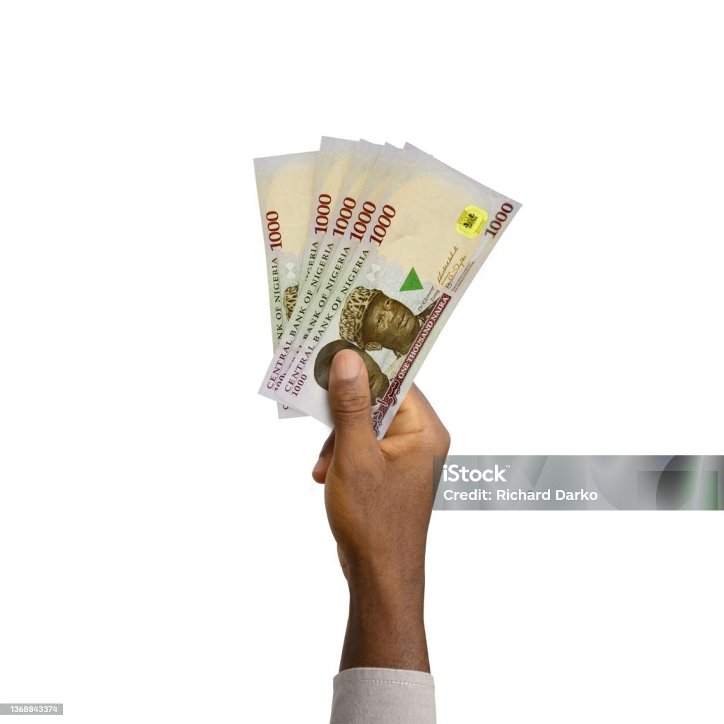 Black Hand holding 3D rendered Nigerian Naira notes Note - Message Stock Photo