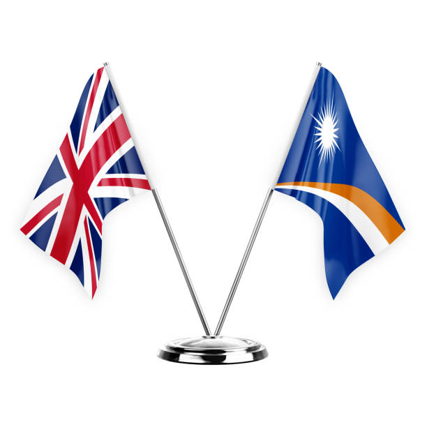 istock Two table flags isolated on white background 3d illustration, united kingdom and marshall islands 1368844240