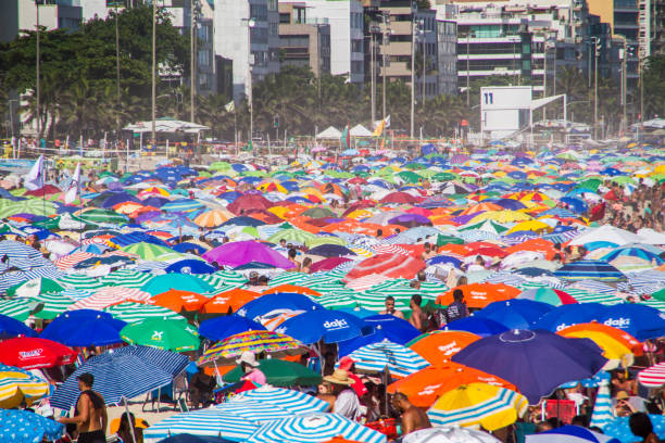 Leblon beach crowded on a typical summer day in Rio de Janeiro, Brazil stock photo