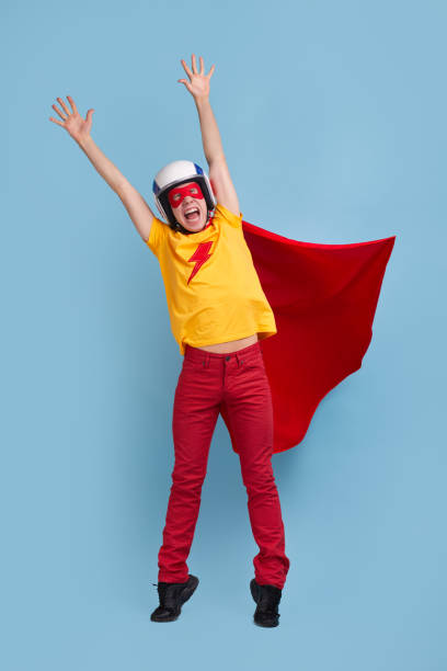 istock Flying superhero man with arms raised 1368847849