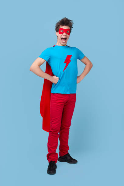 istock Crazy superhero guy in colorful clothes 1368847866