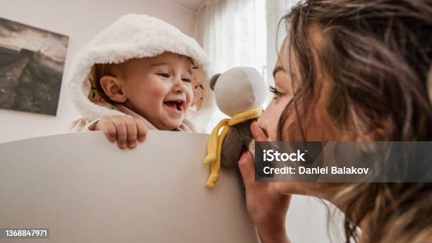 Childcare Mother Playing With Baby At Home Stock Photo - Download Image Now - Nanny, Playing, Baby - Human Age