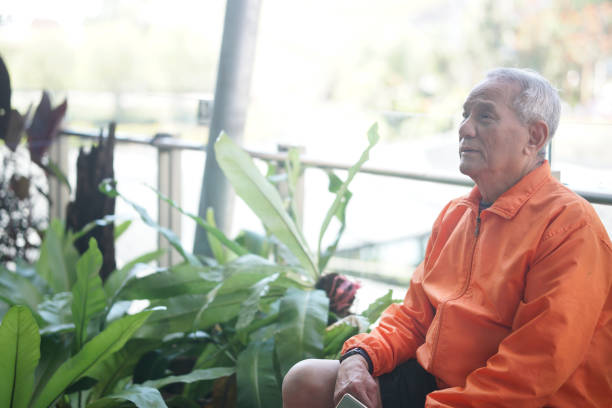 istock old elderly senior elder man relaxing on terrace. 1368848123