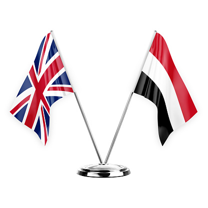 Two table flags isolated on white background 3d illustration, united kingdom and yemen