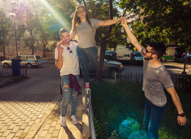 istock Group of friends having fun in down town 1368852440
