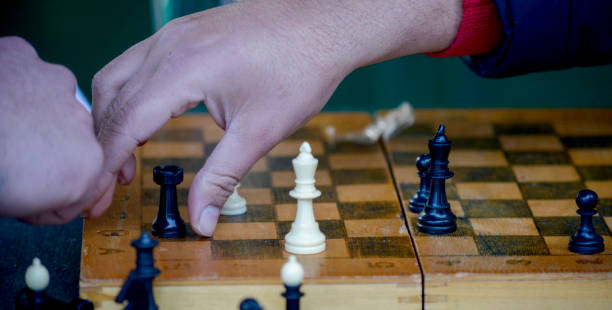 istock Man playing chess outdoor 1368854286