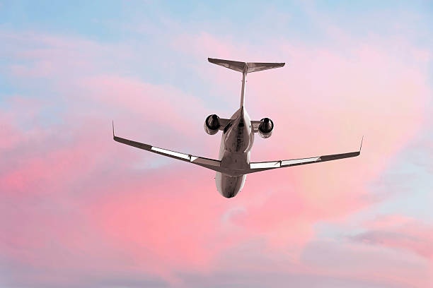istock XXL corporate jet airplane flying at dusk 136885728