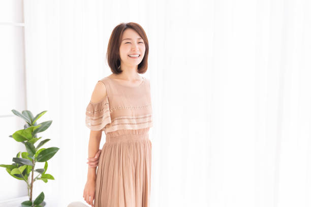 istock attractive asian woman relaxing 1368861218
