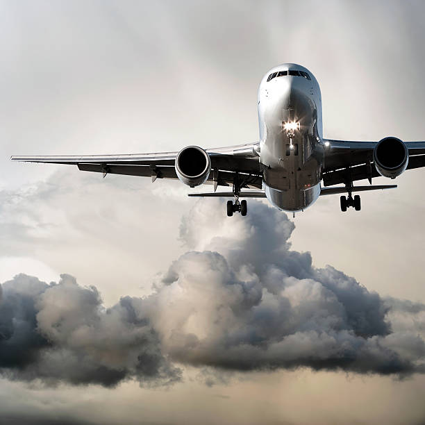 jet airplane landing in storm