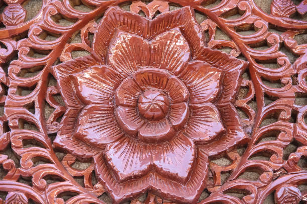 istock Wood texture with engraving flower patterns decorative on wall background 1368862328
