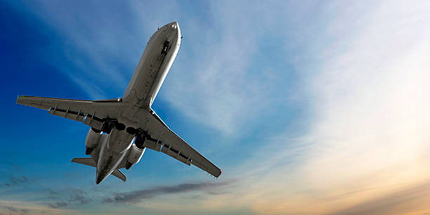 istock corporate jet airplane landing at dusk 136886651