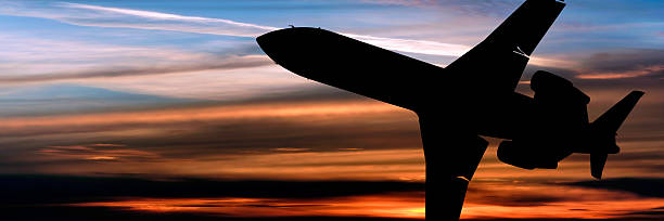 istock corporate jet airplane flying at dusk 136886882