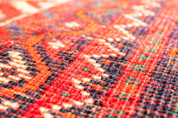 South Persian rug pattern, macro. Backside of carpet with multiple geometric line patterns. Selective focus with defocused and abstract front and back. Textile backdrop or background texture. aboriginal art stock pictures, royalty-free photos & images