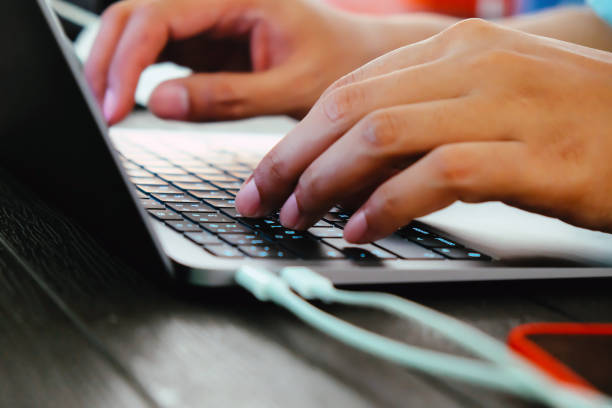 istock businessman typing on laptop keyboard 1368878664