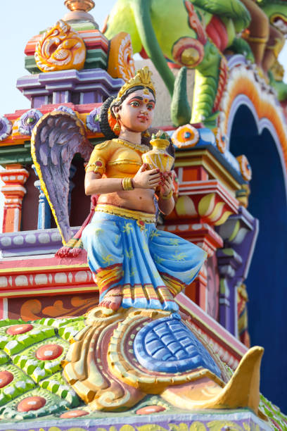 istock Beaituful Angel statue on hindu temple tower 1368882688