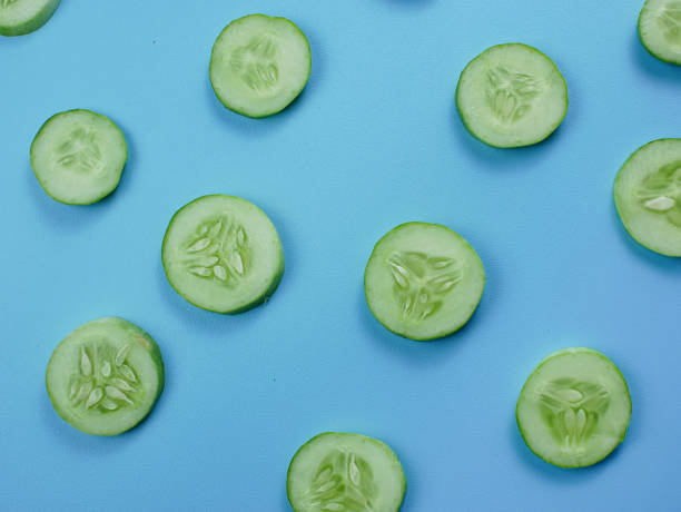 istock cucumber on a blue background. healthy diet food concept 1368883739