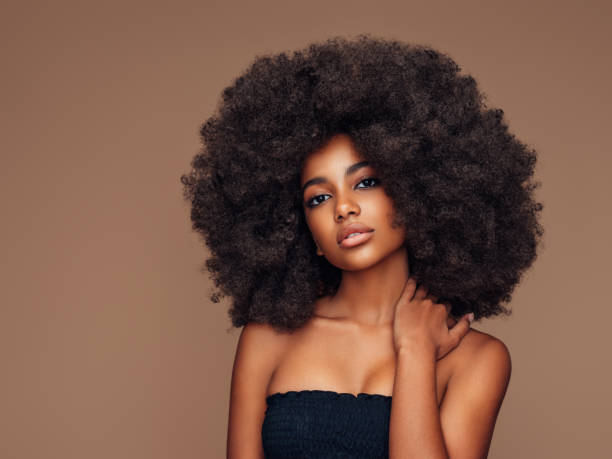 istock Beautiful girl with curly hairstyle 1368889470