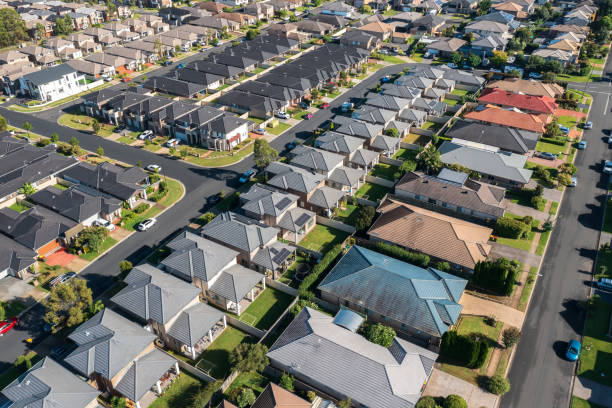 Rows of very similar homes in outer suburban Sydney, Australia Aerial view of rows of mass produced 'cookie cutter' style homes build during the 2010s in outer suburban Sydney, Australia. urban sprawl stock pictures, royalty-free photos & images