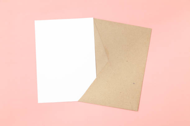 istock Blank white card 5x7 and craft paper envelope 1368892813