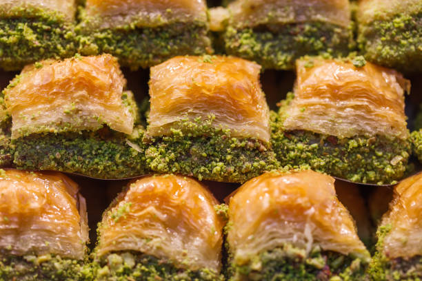 istock Baklava honey with grated pistachios, selective focus. 1368893485