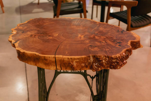 istock Handmade epoxy resin round wood table. Live edge table 1368893692