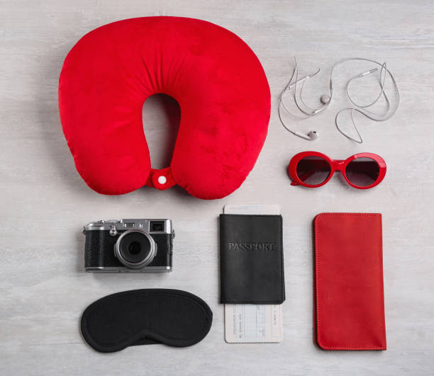 istock Flat lay composition with red travel pillow on light background 1368898358