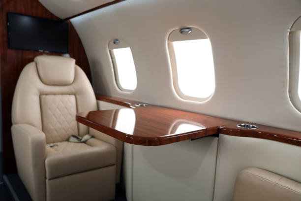 istock Airplane cabin with comfortable seat and table 1368901017