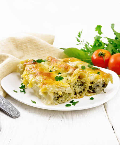 istock Cannelloni with curd and spinach in plate on table 1368901077