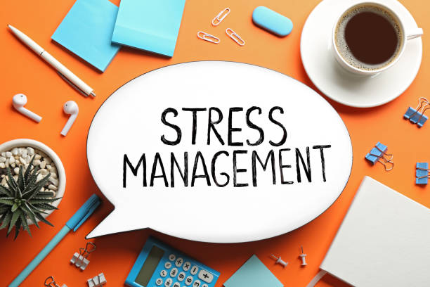 istock Flat lay composition of speech bubble lightbox with phrase Stress Management on orange background 1368909376