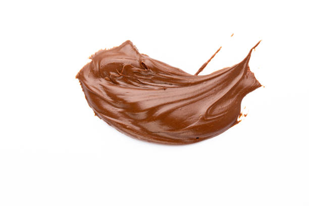 istock Chocolate cream isolated on white background. Flat lay. 1368910987